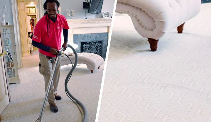 A Man is vacuuming a carpet.