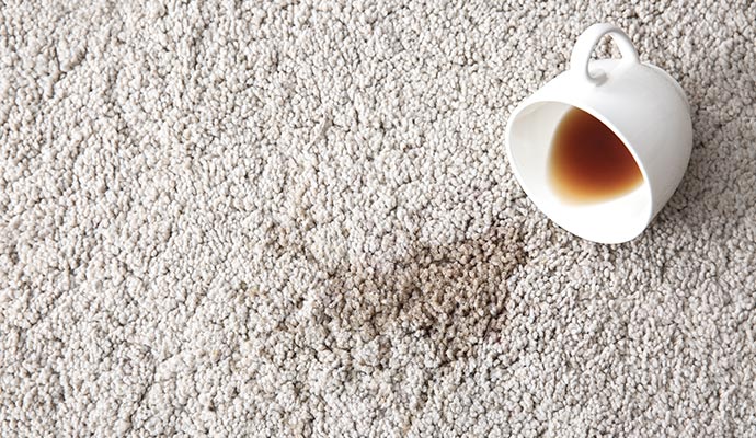 Coffee stain on white carpet