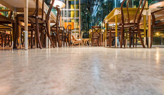 Clean concrete floor in the restaurant dining area