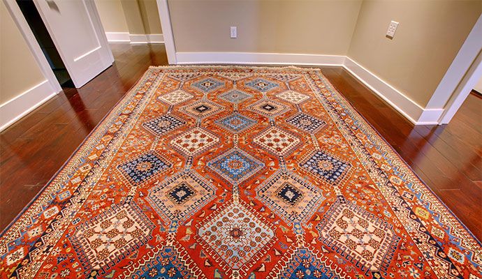 Clean rug placed on a wooden floor