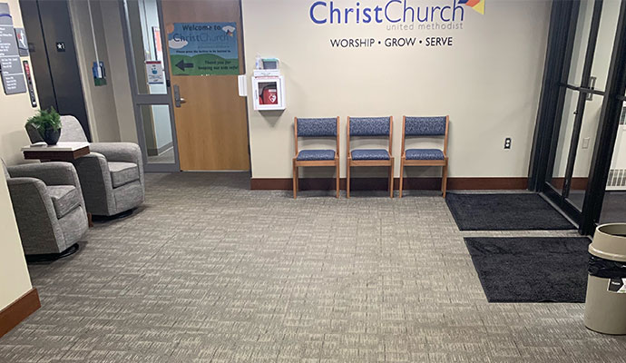 Carpeted lobby and entrance of church