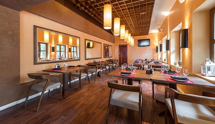 Modern restaurant interior with clean wooden floor