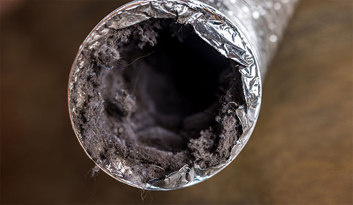 A dirty dryer vent pipe