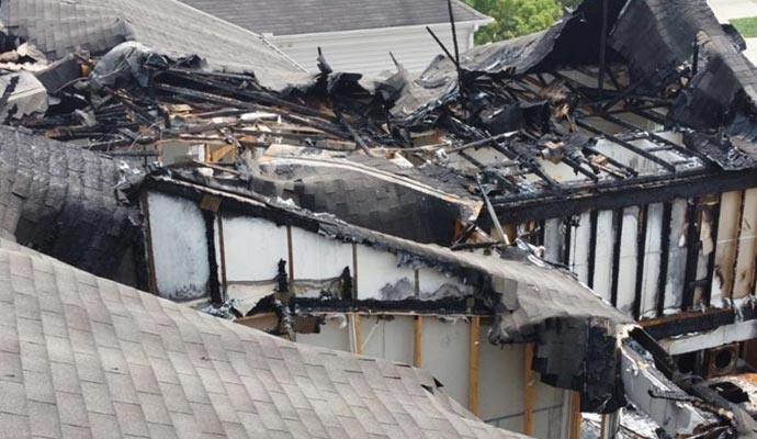Fire damaged house roof