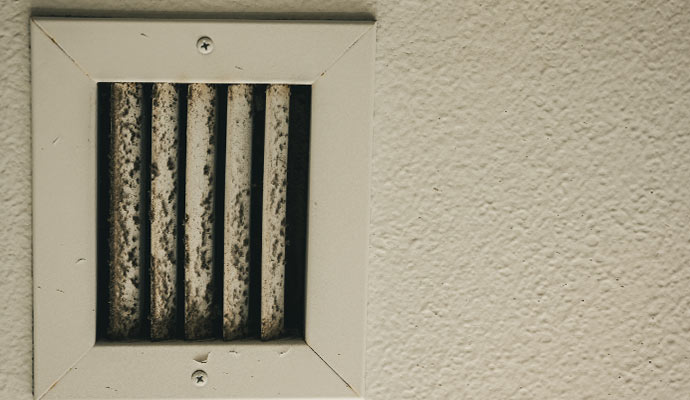 Dirty air vent with dust buildup
