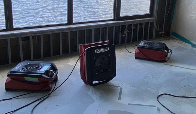 Professional structural drying air movers.