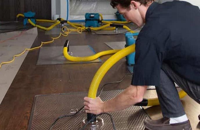 Person cleaning water using equipment