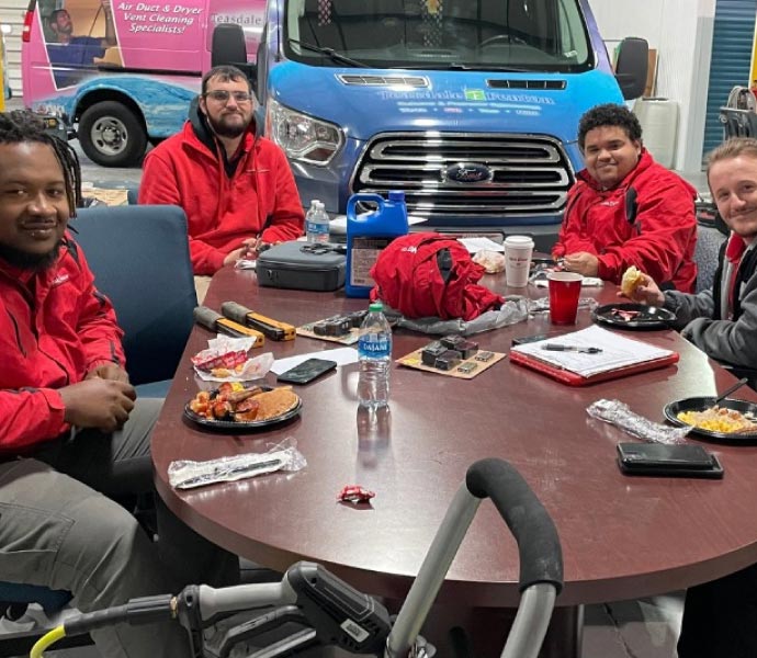 Teasdale Fenton Columbus service team with vehicle