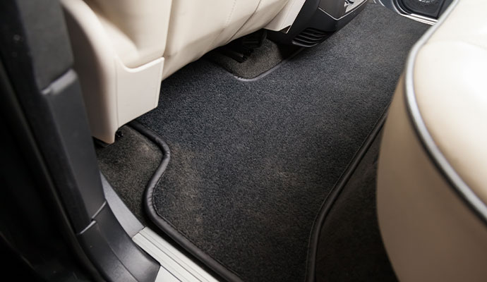 Dust on the car floor mat