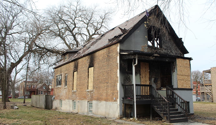 Fire damaged house board up service