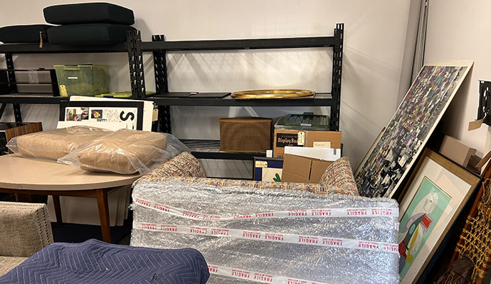 Packed furniture and belongings in contents pack out storage