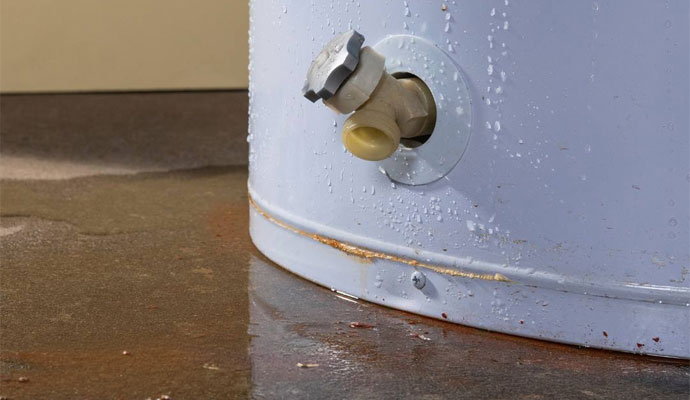 Water leaking from the bottom of a home water heater